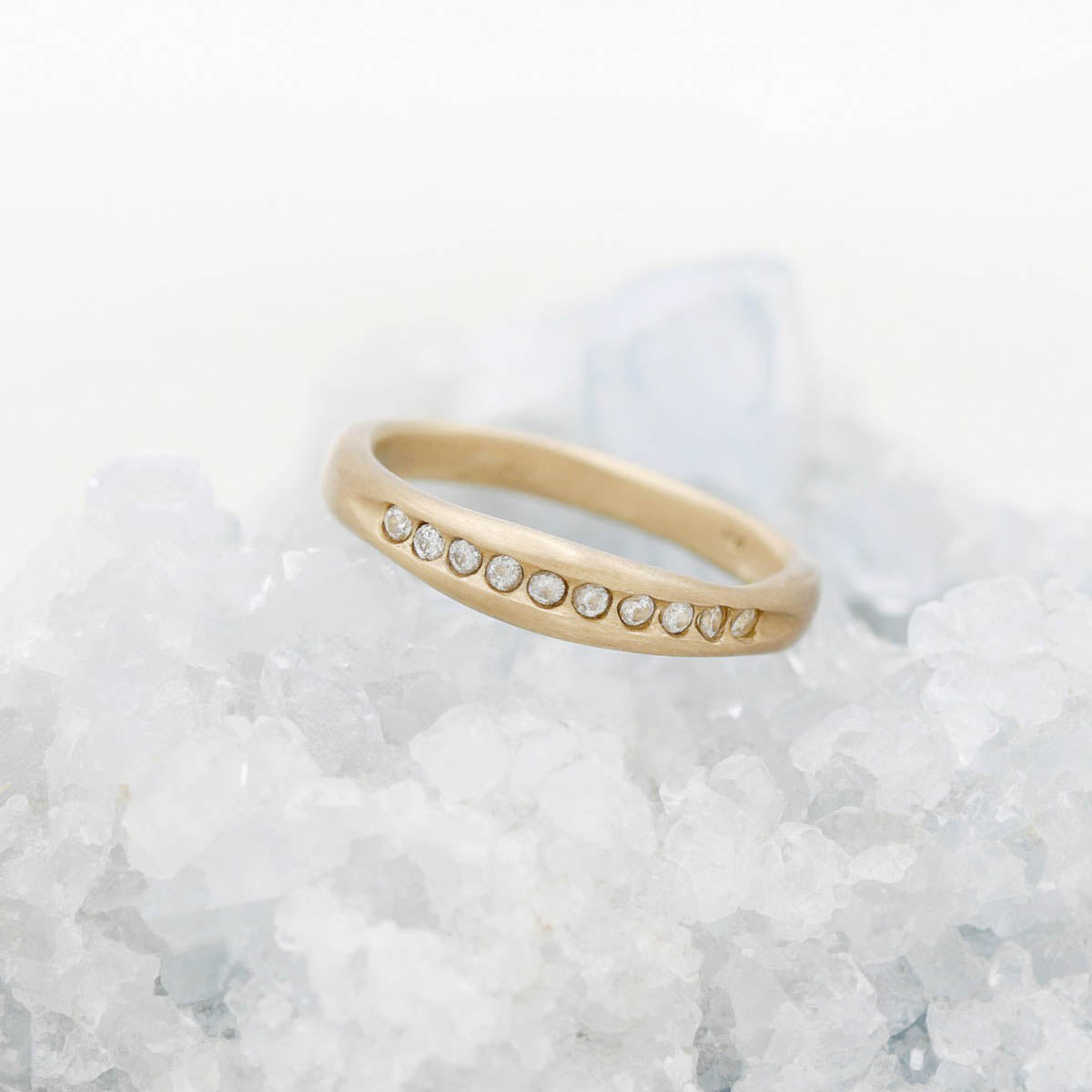 Passage ring handcrafted in 10k yellow gold and display of 1.5mm cubic zirconias 