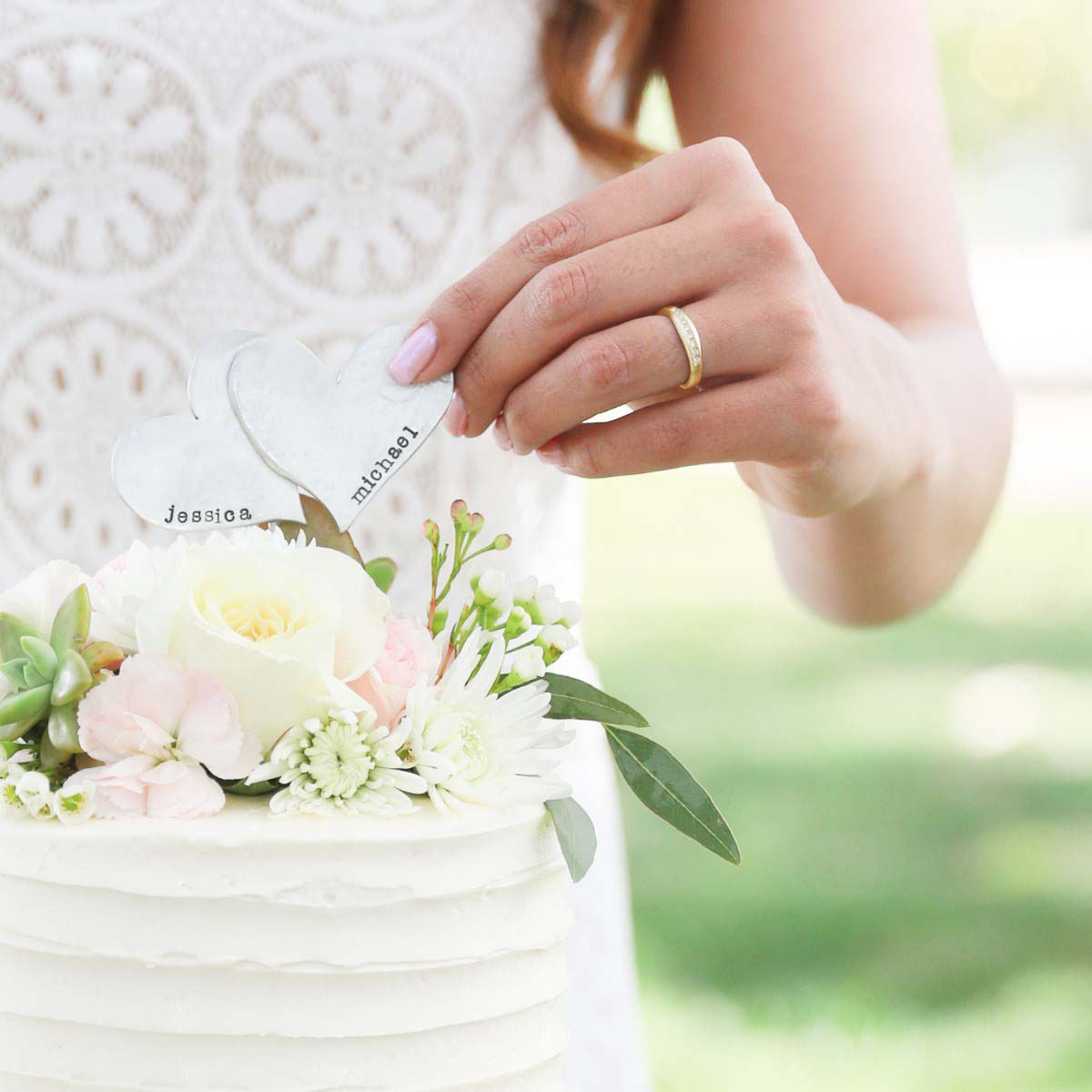 Girl wearing Passage ring handcrafted in 10k yellow gold and display of 1.5mm cubic zirconias 