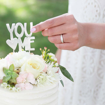 Girl wearing Passage ring handcrafted in sterling silver and display of 1.5mm cubic zirconias  for her wedding