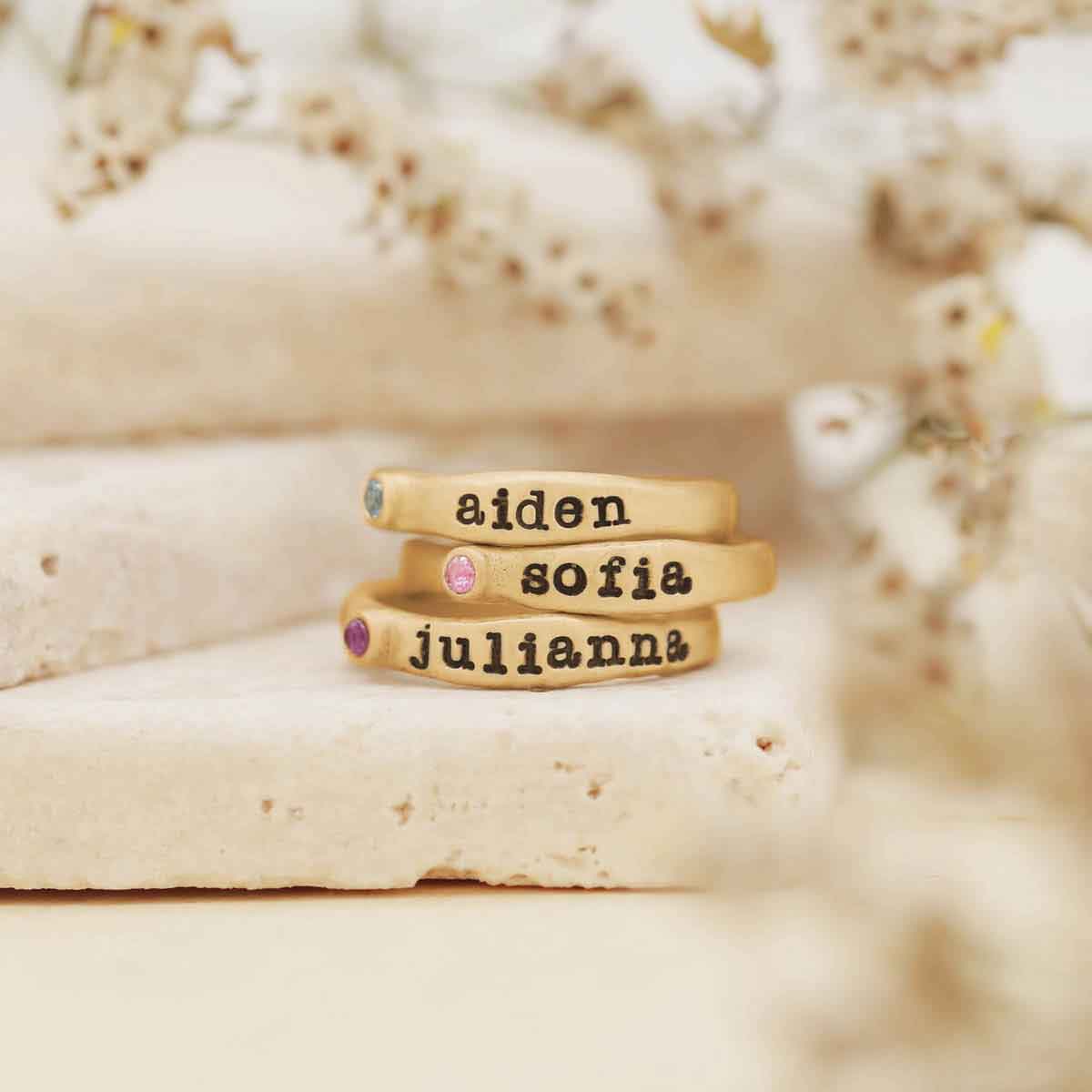 Personalized passage ring handcrafted in 10k yellow gold with your choice of birthstone 