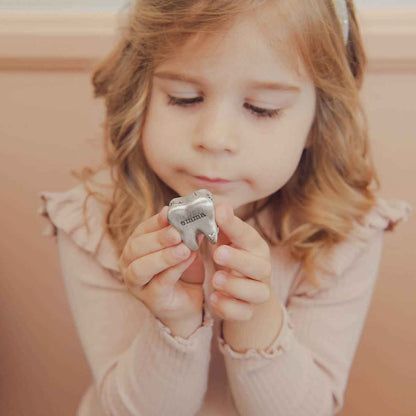 a Personalized tooth fairy box handcrafted in pewter and hand stamped with their name on it