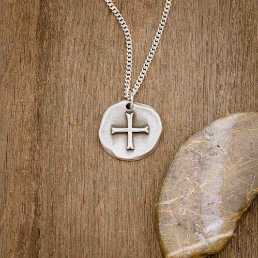 Roman Cross Coin necklace handcrafted in sterling silver strung on sterling silver curb chain