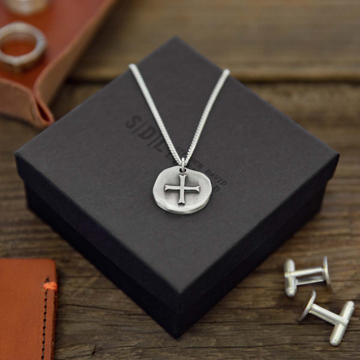 Roman Cross Coin necklace handcrafted in sterling silver strung on sterling silver curb chain