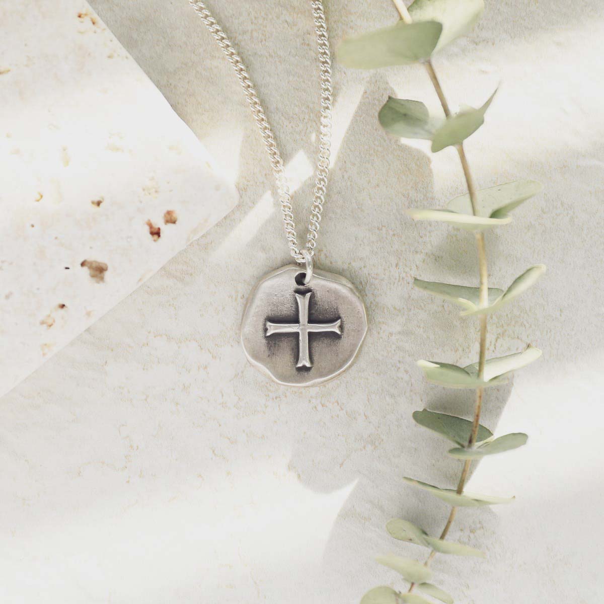 Roman Cross Coin necklace handcrafted in sterling silver strung on sterling silver curb chain