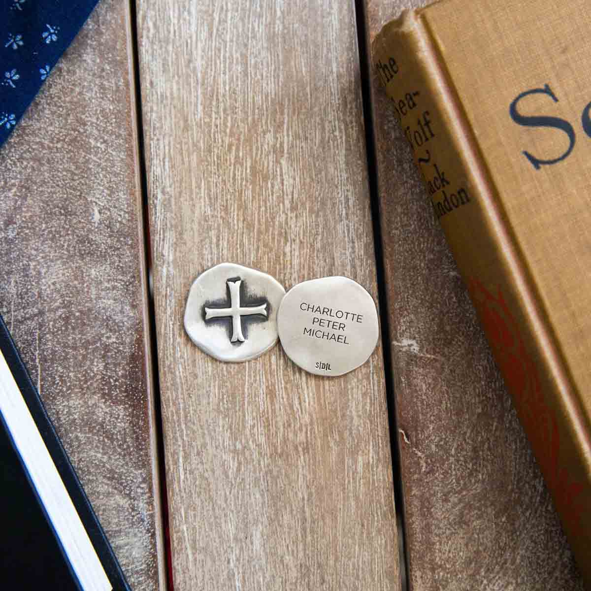 Roman Cross Pocket coin handcrafted in sterling silver and customizable on the back with up to 4 lines