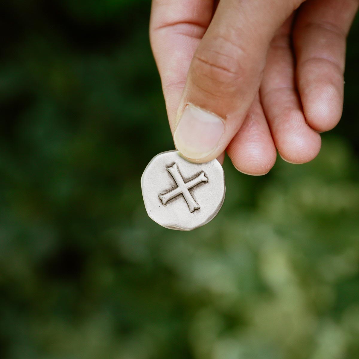 Roman Cross Pocket coin handcrafted in sterling silver and customizable on the back with up to 4 lines