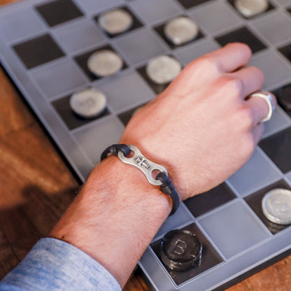 man wearing a Sterling silver Linked Together Cross Bracelet