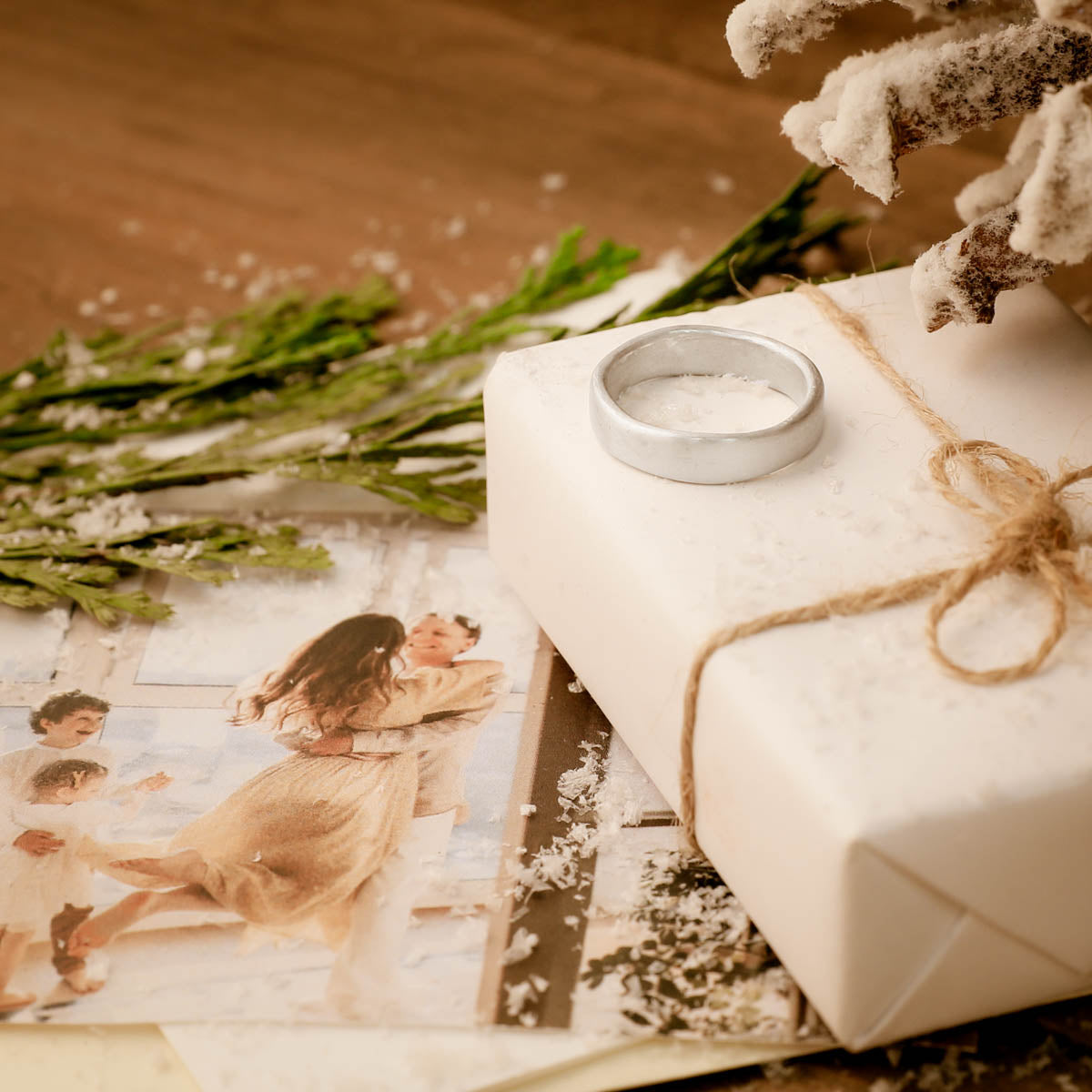 summit ring [sterling silver] on a snowy wooden background