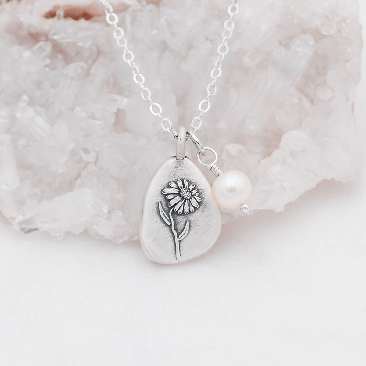 September birth flower necklace handcrafted in sterling silver with a special birth month charm strung with a vintage freshwater pearl