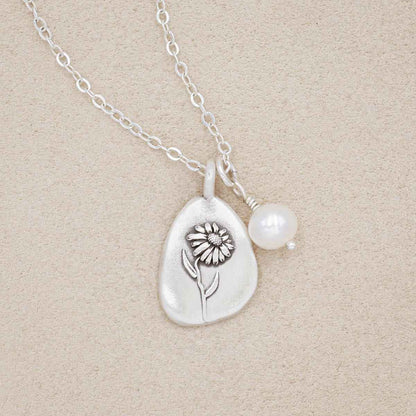 September birth flower necklace handcrafted in sterling silver with a special birth month charm strung with a vintage freshwater pearl