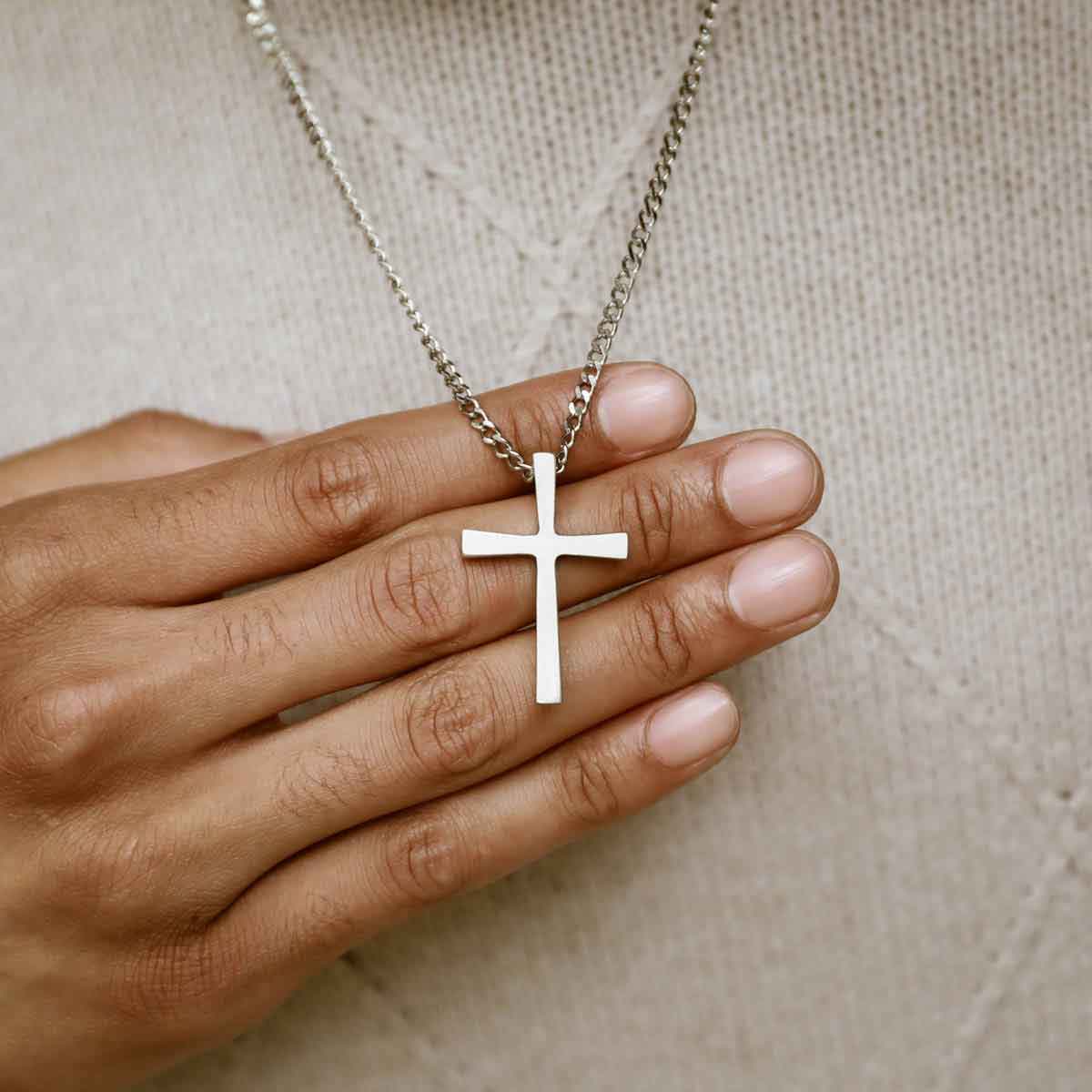 man wearing a pewter Set Free Cross Necklace