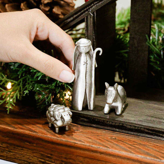 shepherd nativity figurine set hand-molded and cast in fine pewter and including a shepherd, donkey and sheep