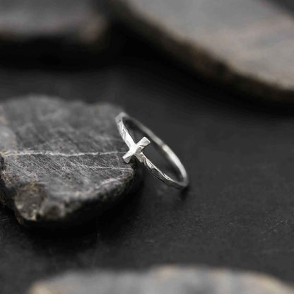 woman wearing a sterling silver Simple Hammered Cross Ring