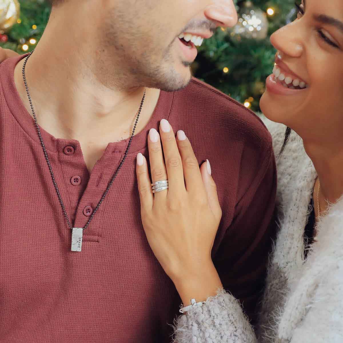 girl wearing sterling silver stackable name rings