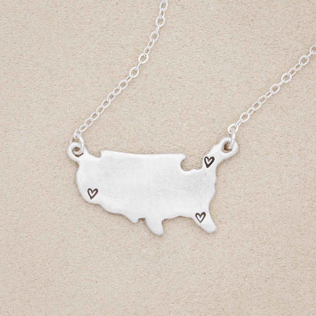 sterling silver state of my heart necklace, personalized with stamped hearts on states