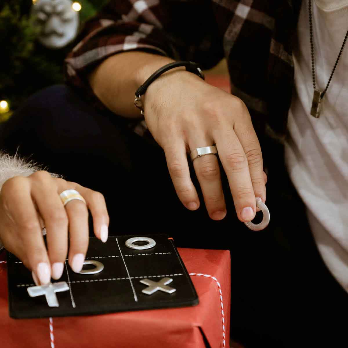  holding gift box with girlfriend