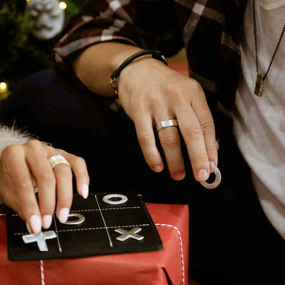  holding gift box with girlfriend