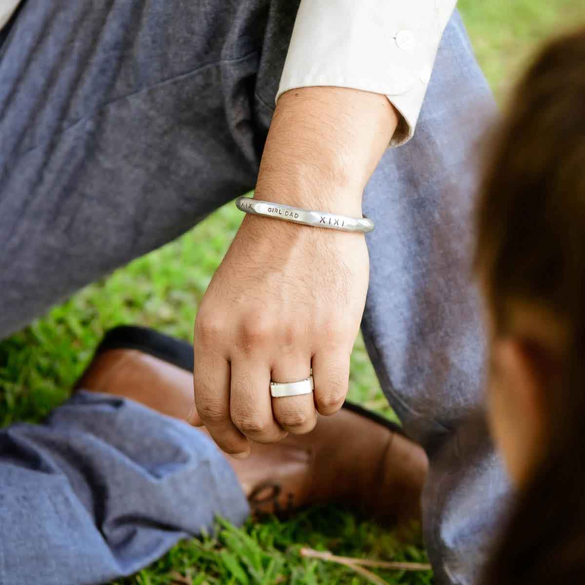 man wearing strong + true narrow ring [sterling silver]