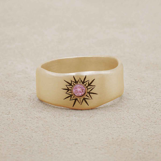 Sunburst birthstone ring handcrafted in 10k yellow gold and set with a birthstone of your choice