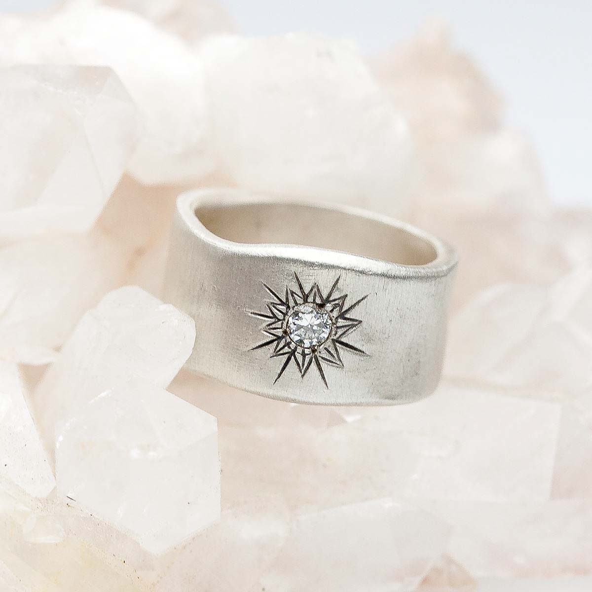 sterling silver sunburst diamond ring with a 3mm conflict free diamond 