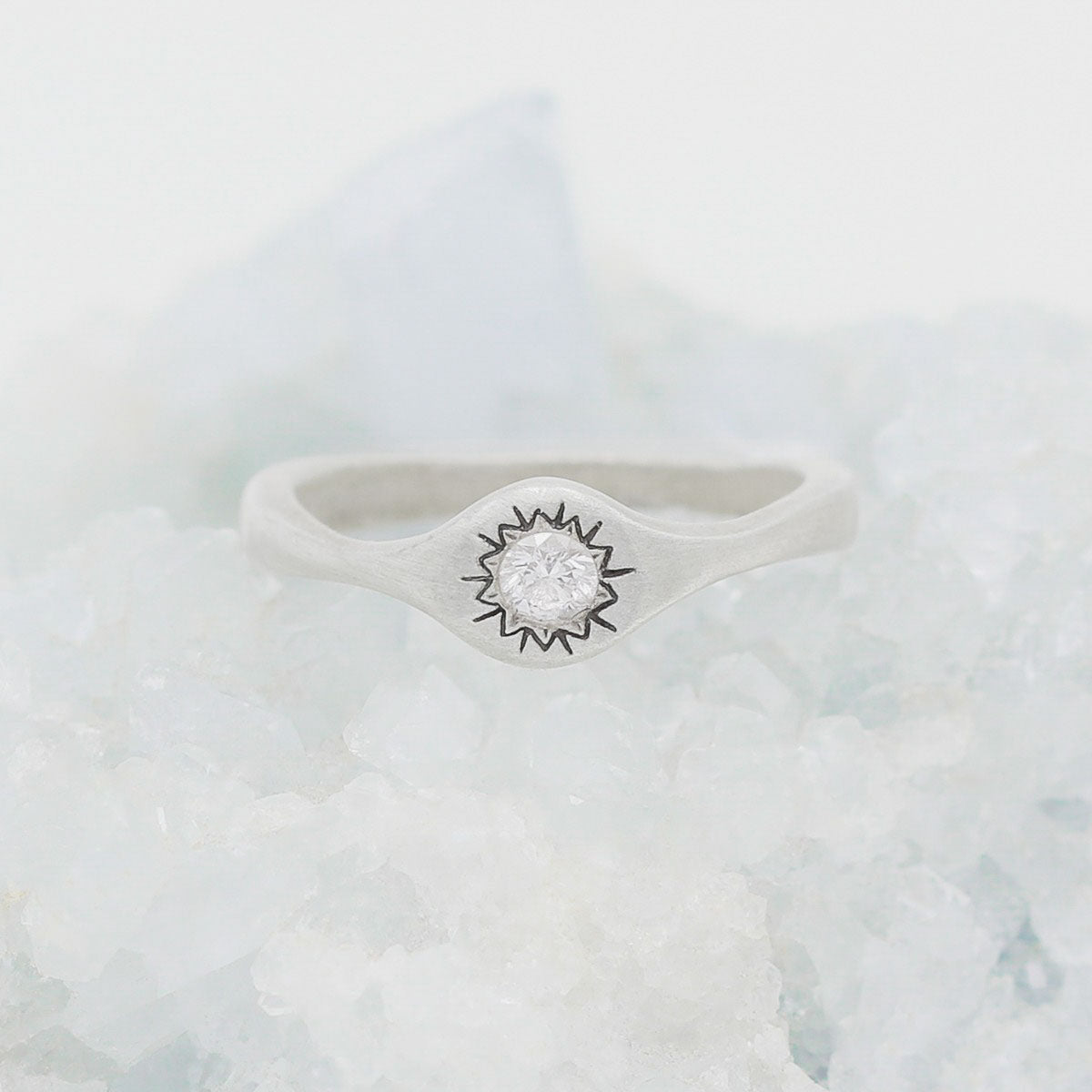 Sunburst stacking ring handcrafted in sterling silver and set with a 3mm bright genuine diamond