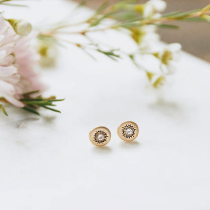 10k yellow gold sunburst stud earrings with a matte-brushed finish with 3mm crystals 