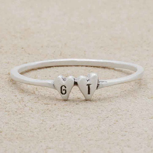 girl wearing sterling silver Sweet Love Initial Ring - Two Hearts