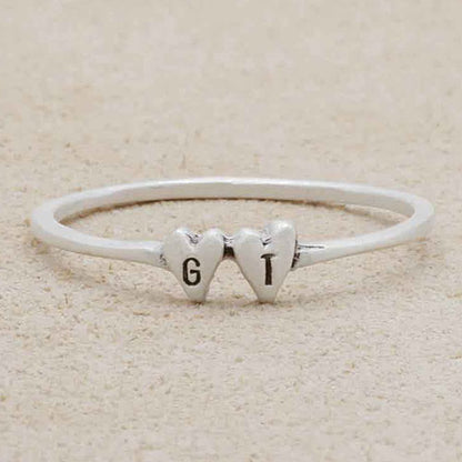 girl wearing sterling silver Sweet Love Initial Ring - Two Hearts