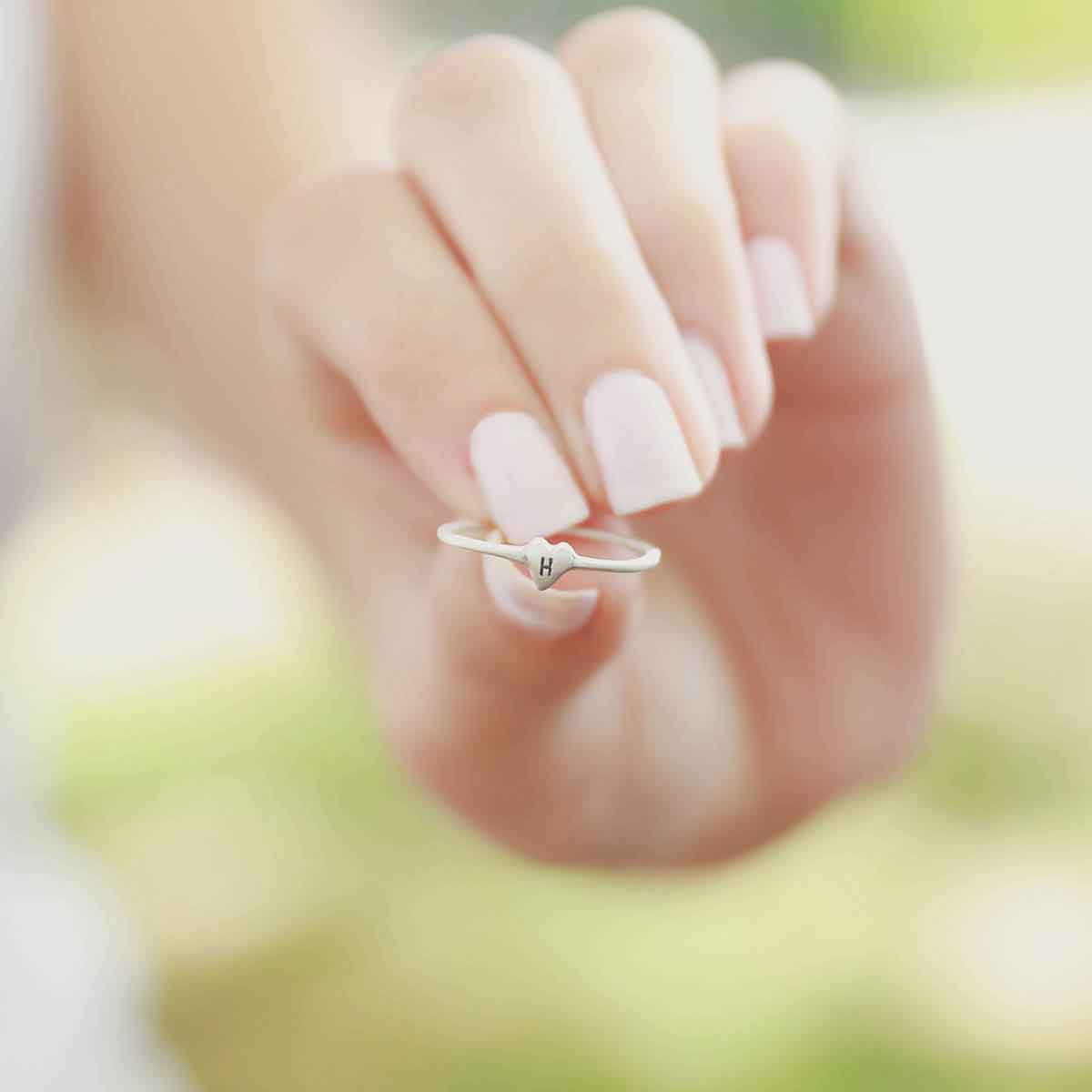 girl wearing sterling silver Sweet Love Initial Ring - One Heart