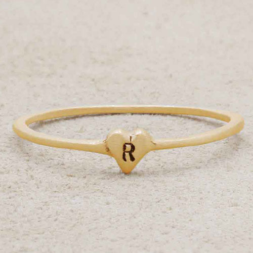 girl wearing 14k yellow gold Sweet Love Initial Ring - One Heart personalized with an initial