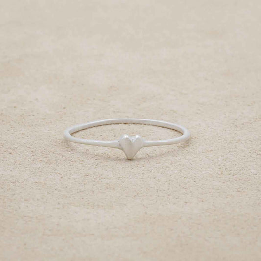 sterling silver sweet love ring - one heart on a marble background