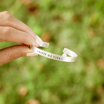 hand holding thin sterling cuff