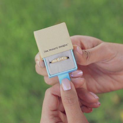 girl holding a Togetherness ring