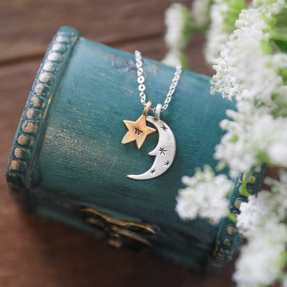 Twinkle little stars necklace with sterling silver and bronze star and moon charms personalized with initials