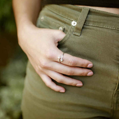 woman wearing a sterling silver Wrapped in Christ’s Love Adjustable Cross Ring