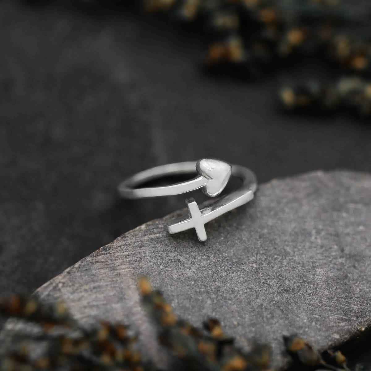 woman wearing a sterling silver Wrapped in Christ’s Love Adjustable Cross Ring