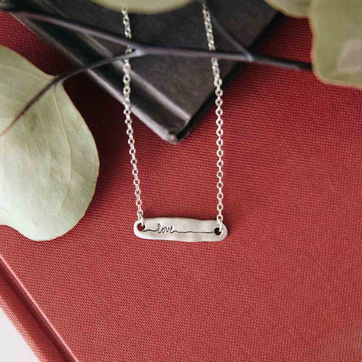 sterling silver written with love necklace