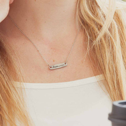 girl wearing you are brave pewter necklace