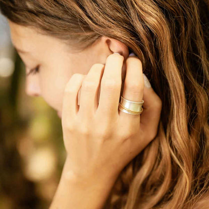 close up of girl wearing the you have my heart spinner ring {sterling silver & 10k gold}