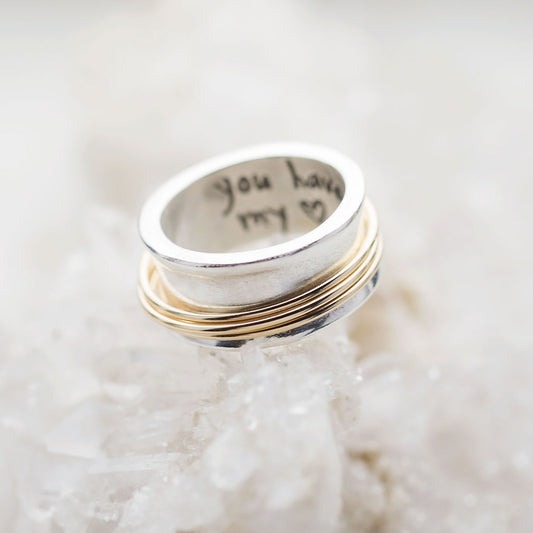 You Have my Heart Spinner ring with a sterling silver band and gold-filled spinners and phrase engraved on the inside