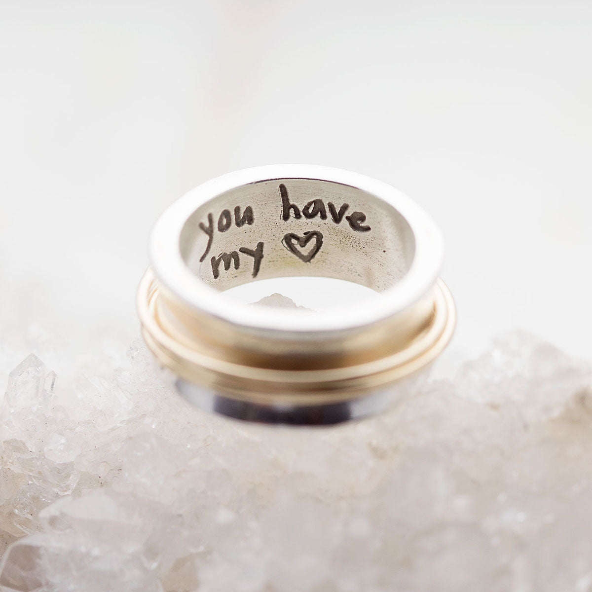 You Have my Heart Spinner ring with a sterling silver band and gold-filled spinners and phrase engraved on the inside