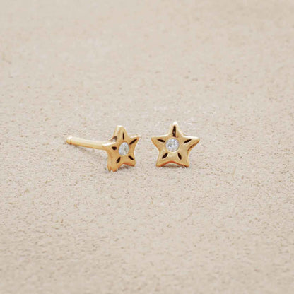 Your Spark Earrings, handcrafted in 10k yellow gold, set with a 1.5mm cubic zirconia