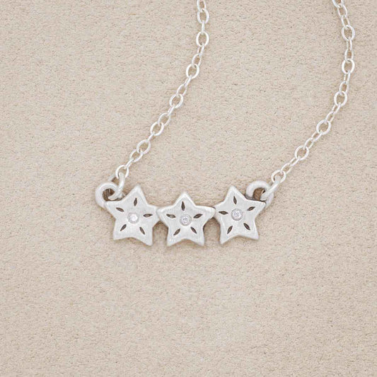 sterling silver your spark necklace with 1.5mm cubic zirconia in each star and strung on silver link chain