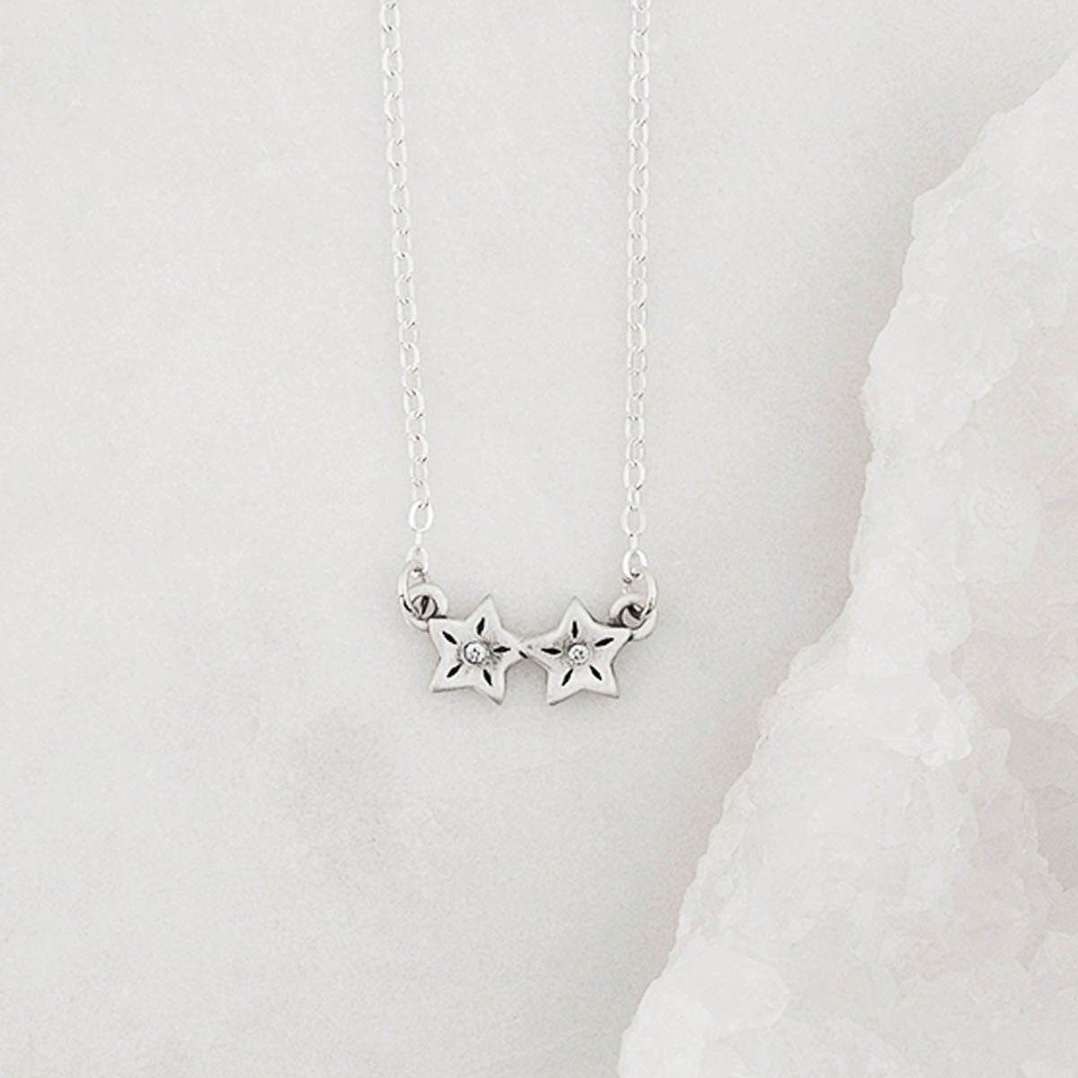 sterling silver your spark necklace with 1.5mm cubic zirconia in each star and strung on silver link chain