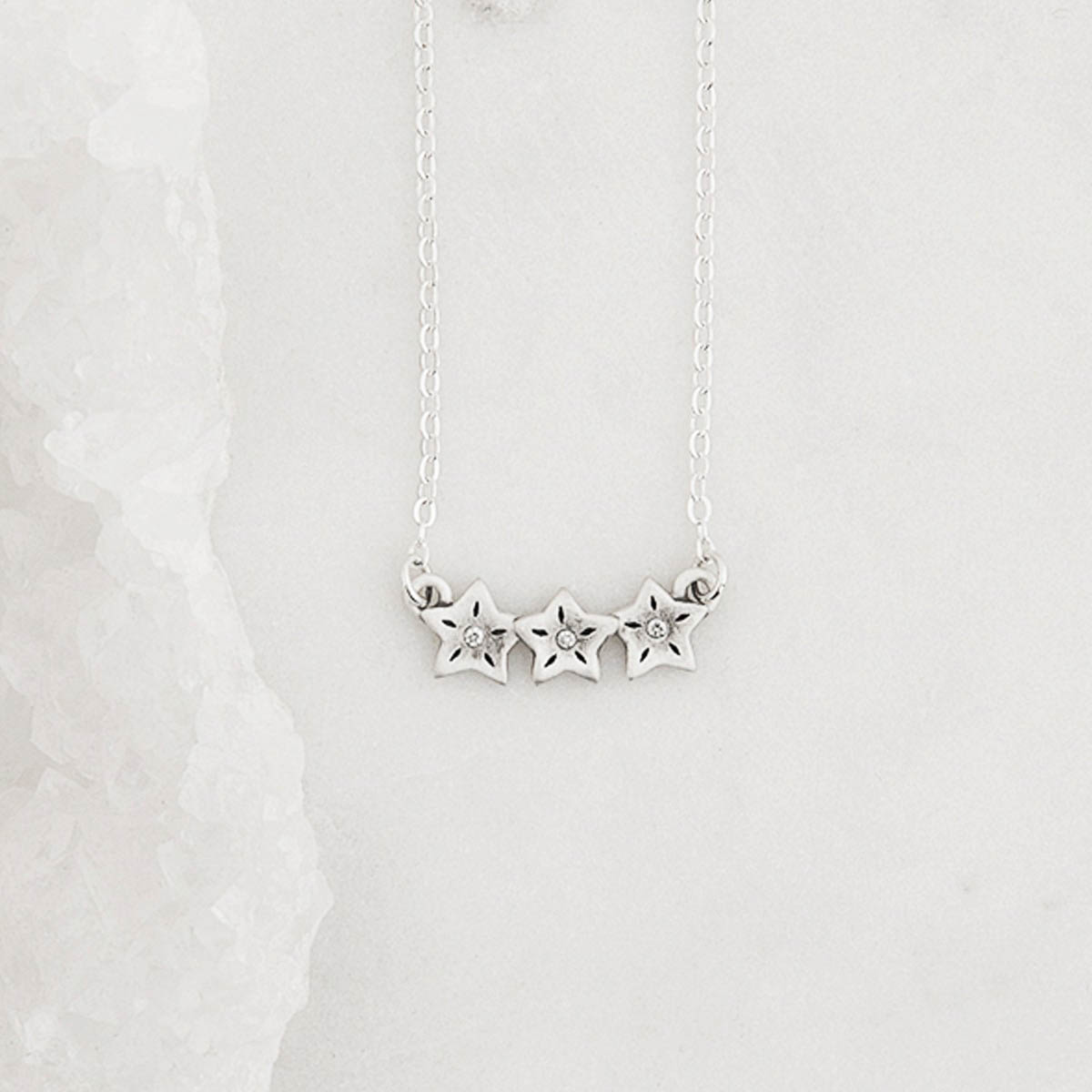 sterling silver your spark necklace with 1.5mm cubic zirconia in each star and strung on silver link chain